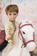 Doll in a suit with a white horse against a colorful background