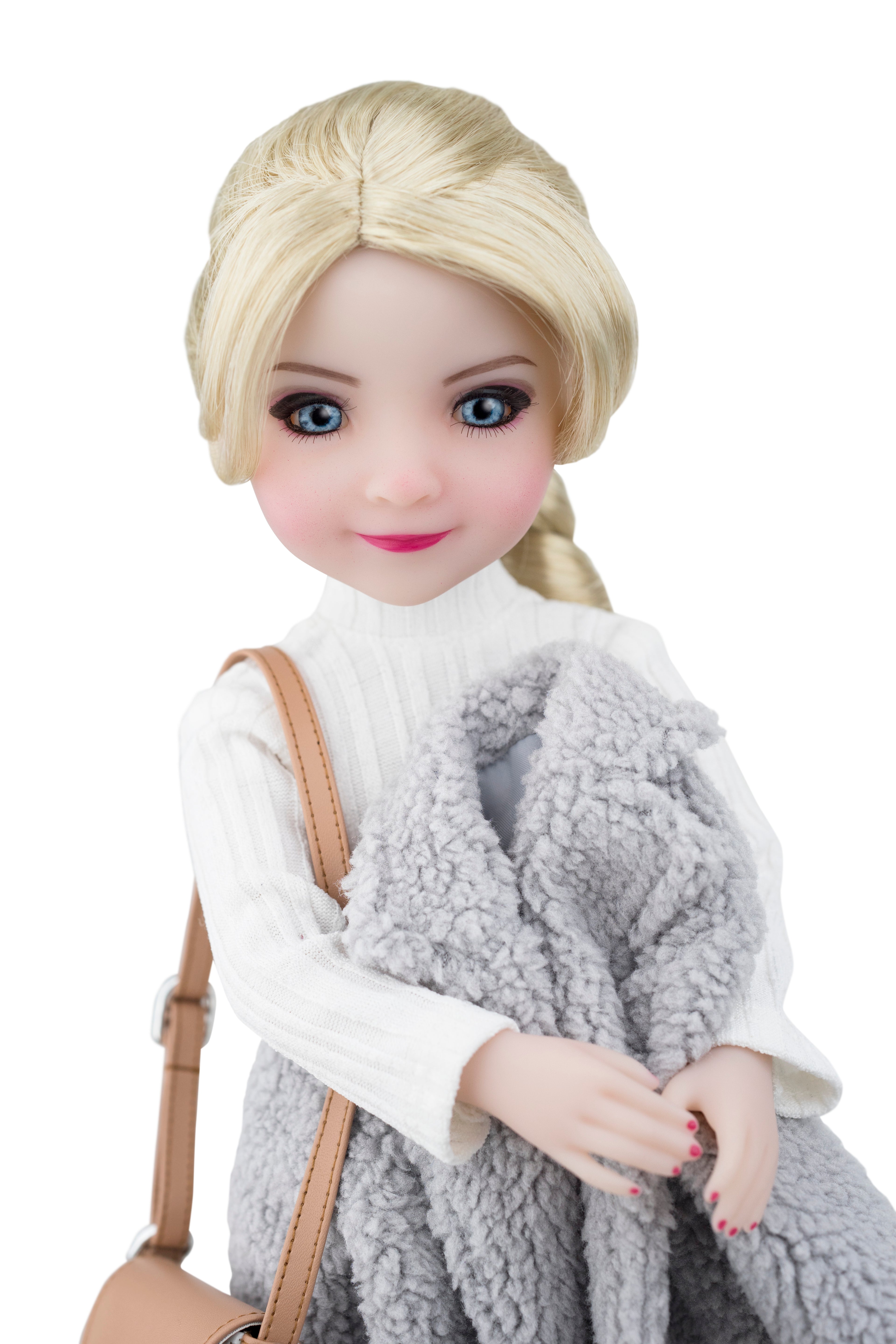 Doll with blonde hair, white sweater, and gray scarf holding a brown bag on a white background