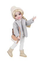 Doll wearing a gray textured coat, white pants, beige boots, and a beige beanie with a brown handbag on a white background.