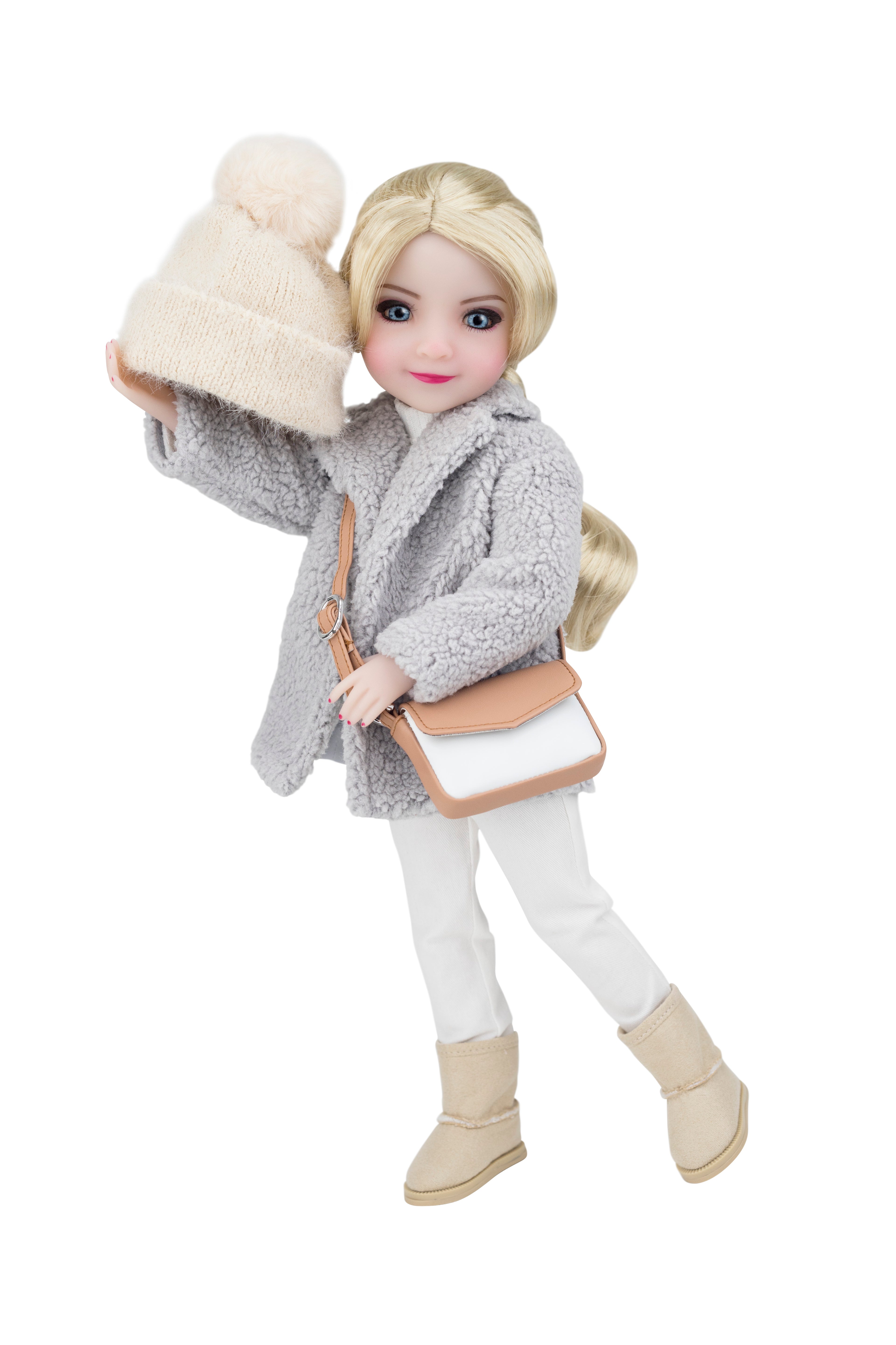 Doll wearing a gray coat, white pants, beige boots, and holding a cream hat and bag on a white background
