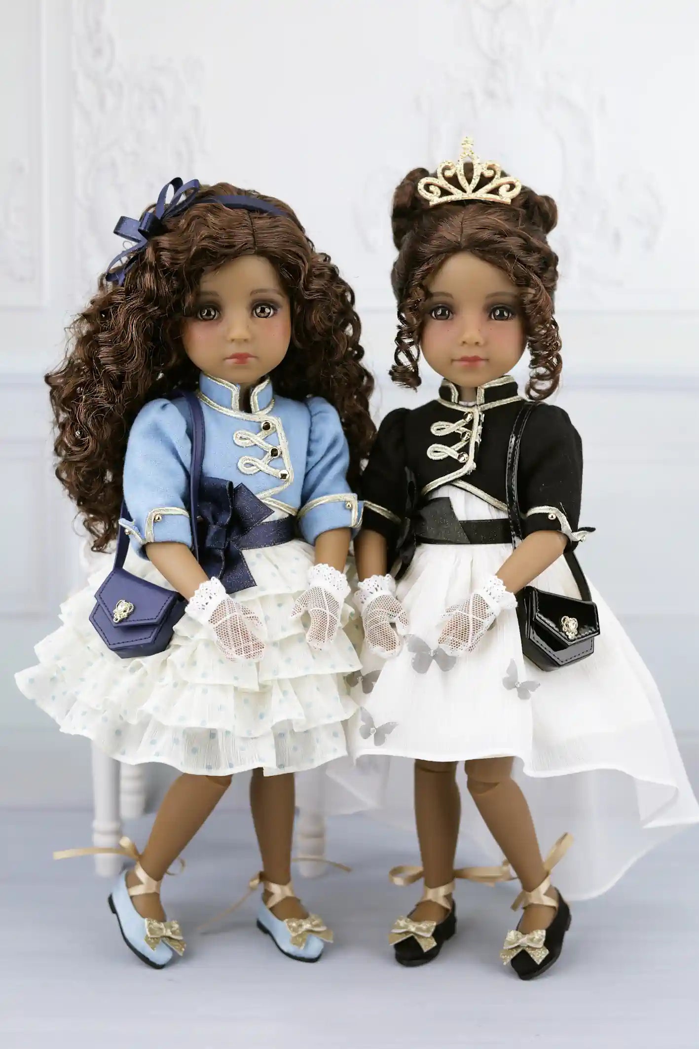 Esther and Ruth in formal attire with accessories on a white background