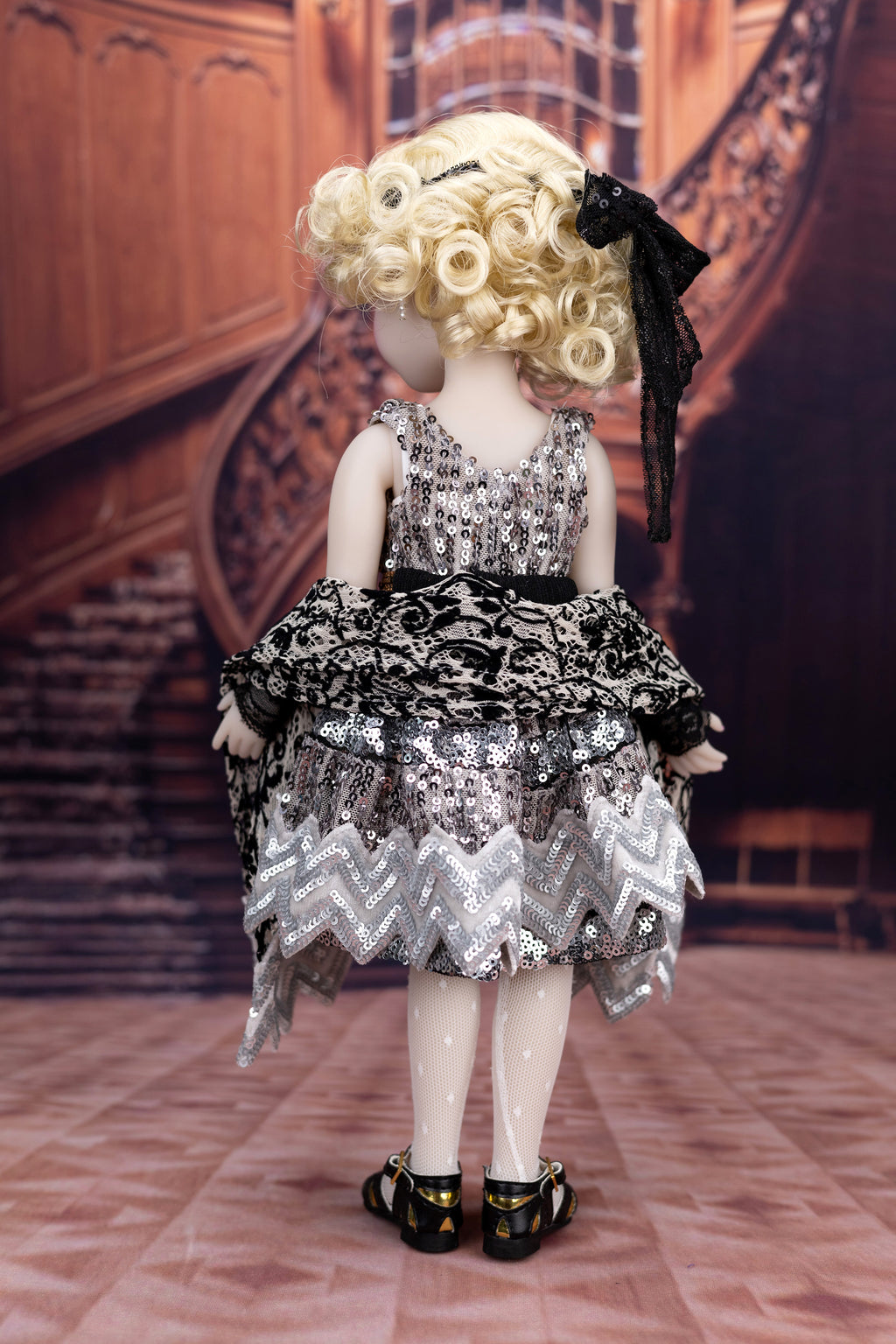 Mannequin in a decorative dress with a vintage interior background