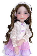 Doll with long brown hair wearing a white lace top and pink skirt on a white background