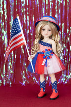 Doll in patriotic outfit with American flag and red, white, and blue accessories against a festive background.