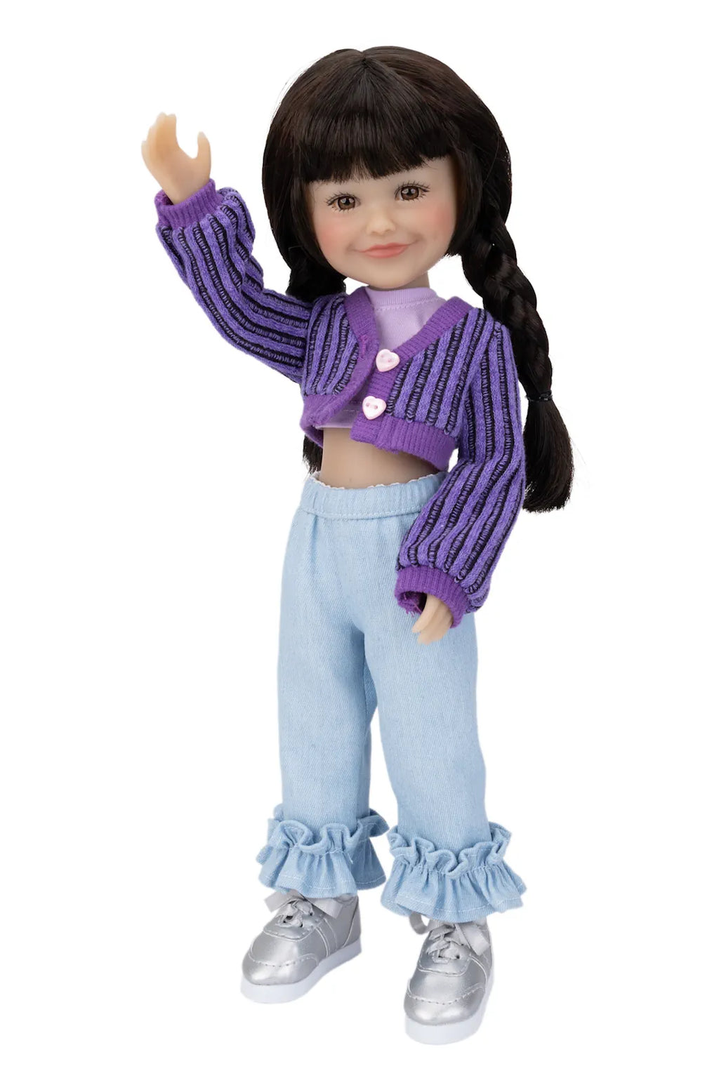 Doll wearing a purple cardigan, light blue pants, and silver shoes on a white background