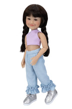 Doll wearing a purple top and light blue pants with ruffles on a white background