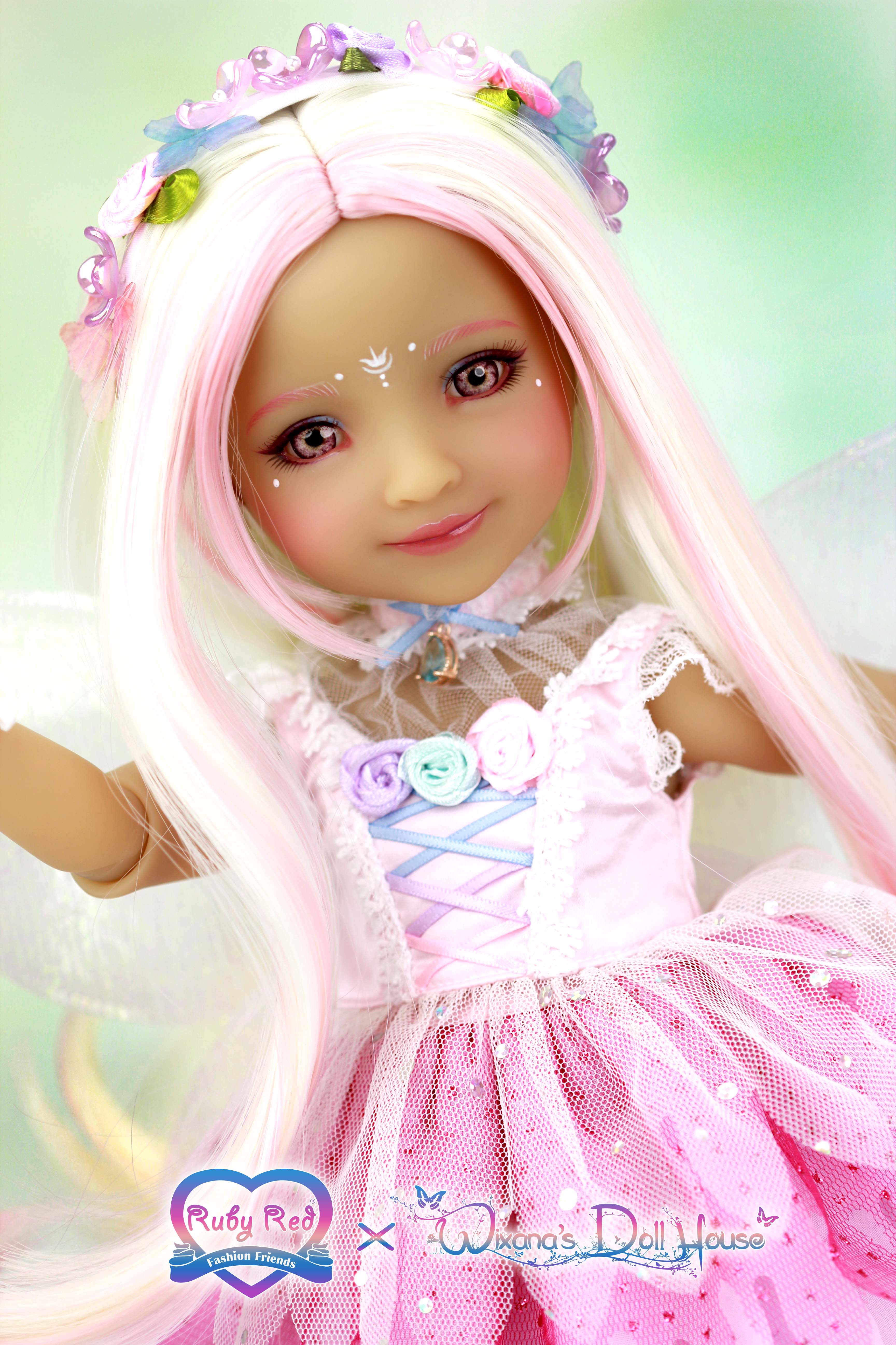 Doll with pink hair and dress