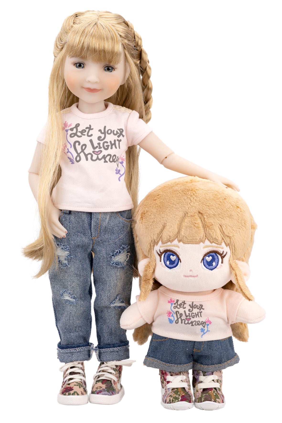 Sara and Fluffy Sara dolls, one larger and one smaller, wearing matching outfits with text on a white background.