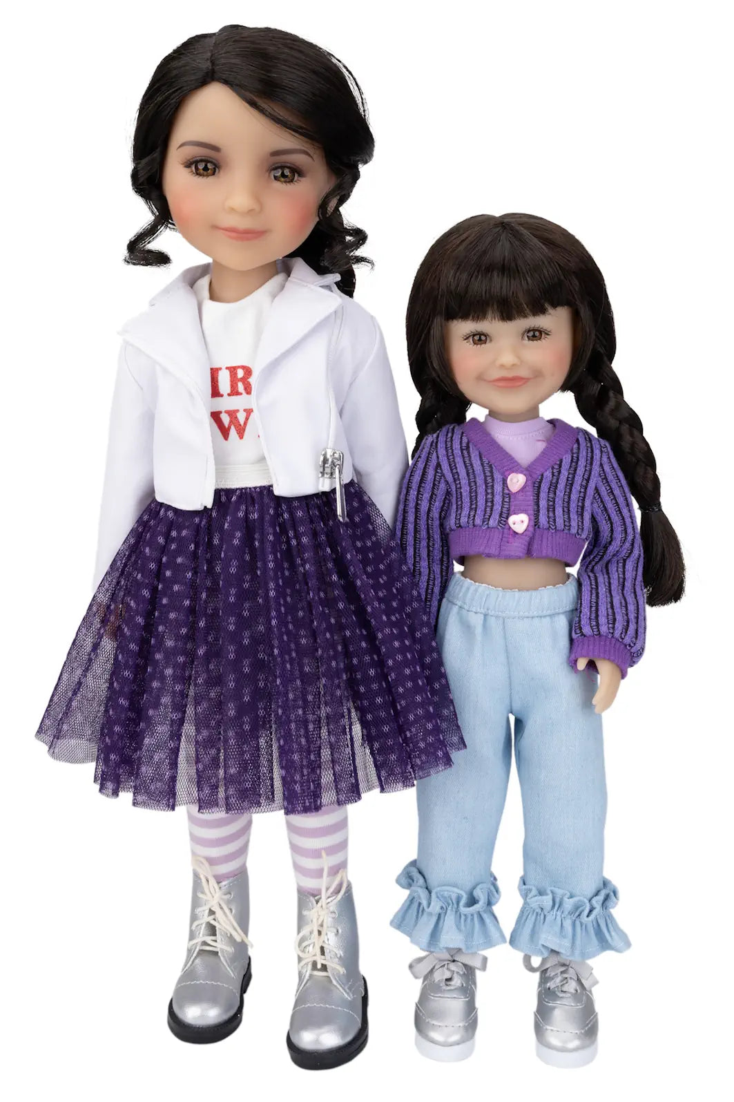 Two dolls wearing outfits with a white background