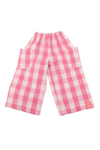 Pink and white checkered pants on a white background