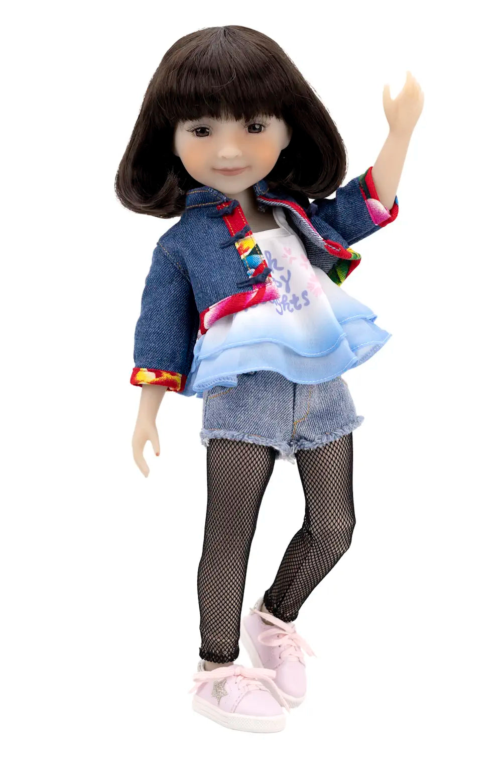 Doll wearing a denim jacket, colorful top, shorts, and fishnet stockings on a white background