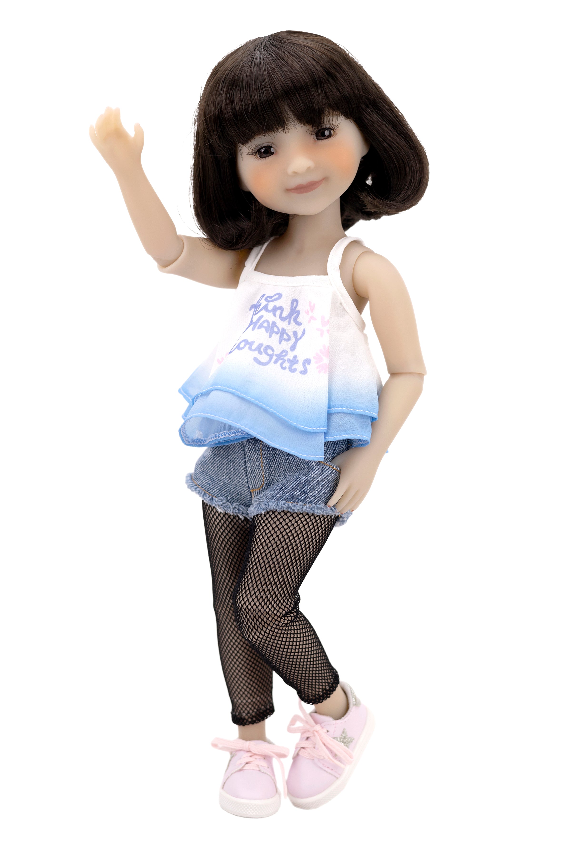 Hanna wearing a denim outfit with a white background