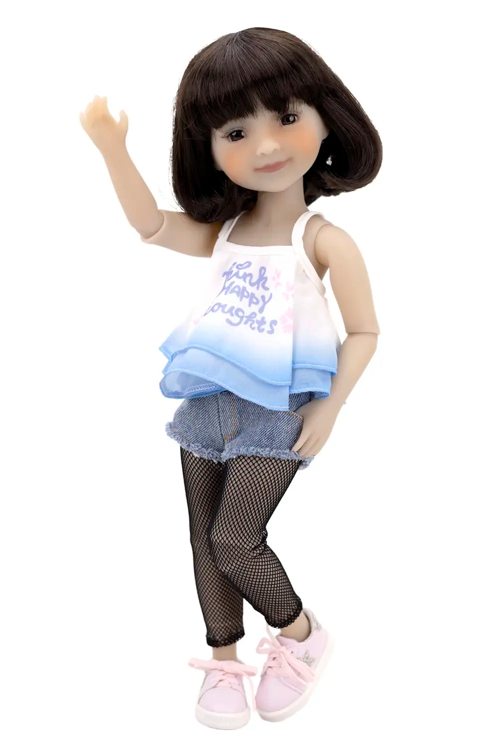 Doll wearing a white top with text, denim shorts, black tights, and pink shoes on a white background