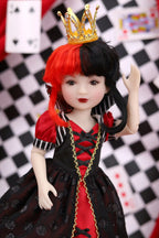Doll with red and black outfit and gold crown against a checkered background
