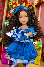 Doll in a blue dress with a festive background