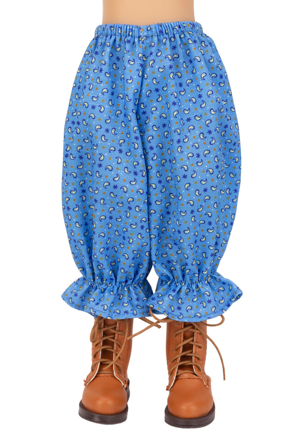 Blue patterned pants with brown boots on a white background