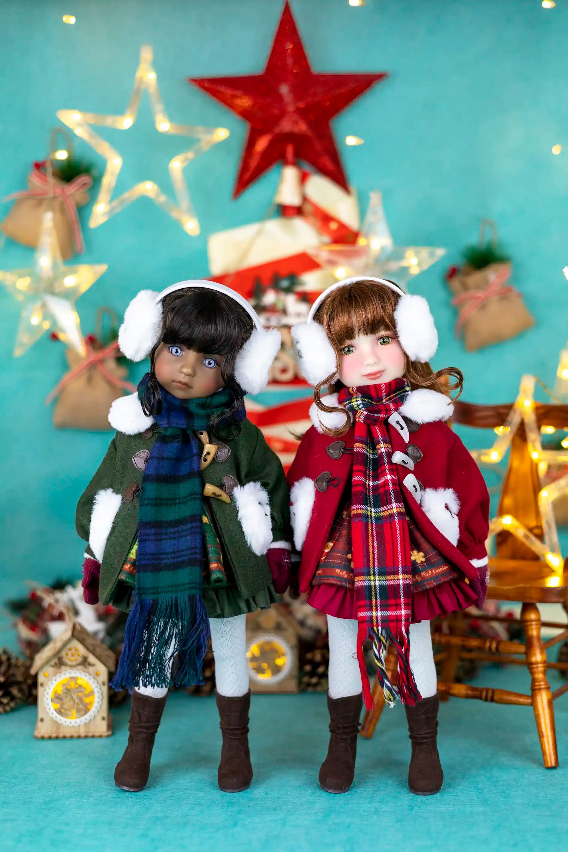 Two dolls in winter clothing with a festive background featuring stars and lights.
