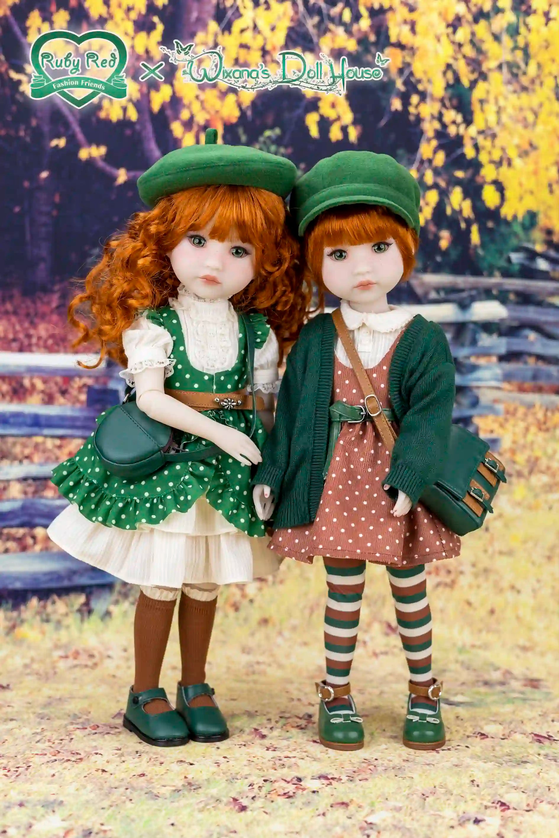 Two dolls with red hair and green outfits standing in a scenic outdoor setting.