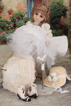Photo showing all content of the doll set including unbrella, hat, shoes and doll stand.
