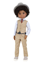 Doll wearing a beige suit with a hat on a white background