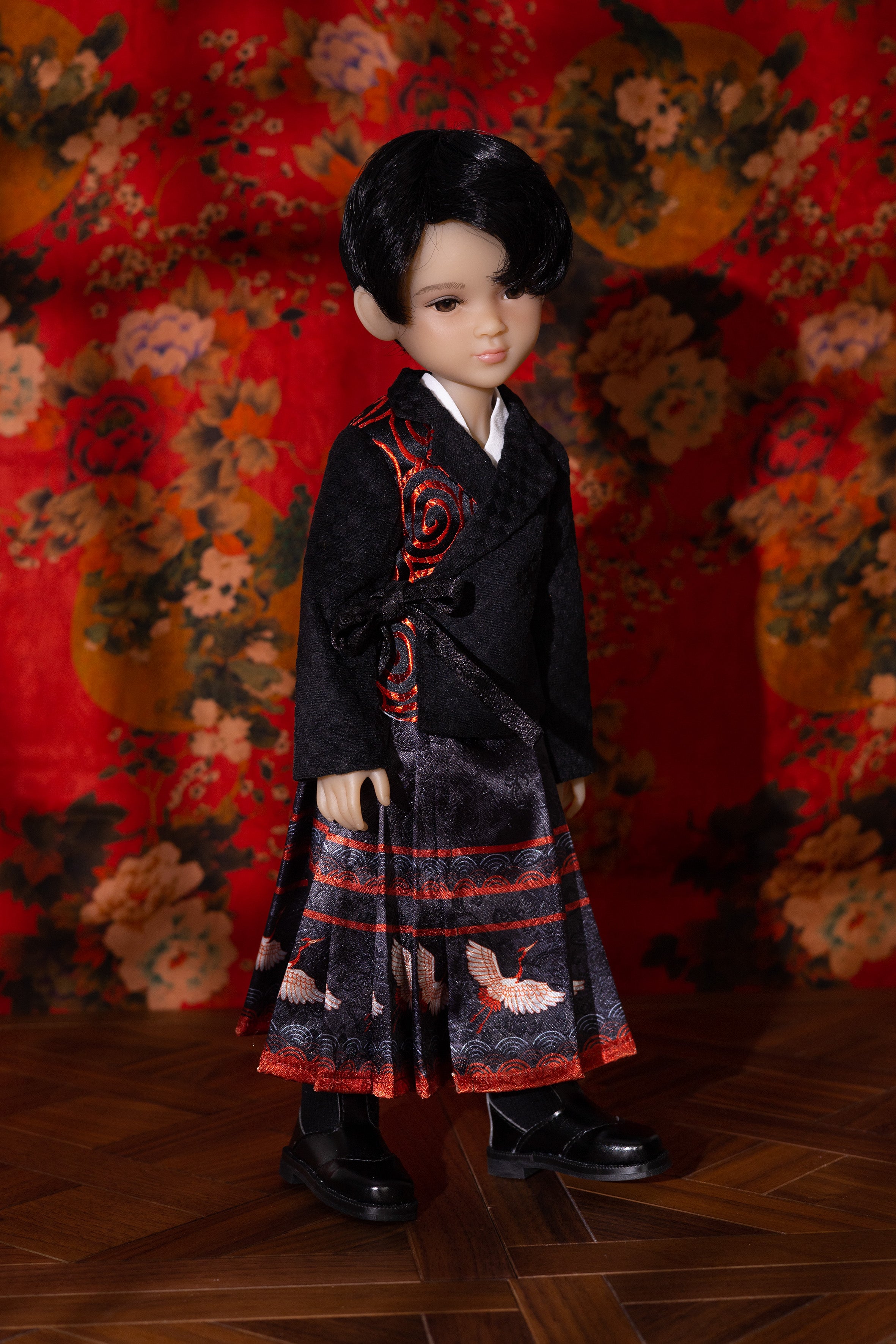 Doll in traditional outfit with floral background