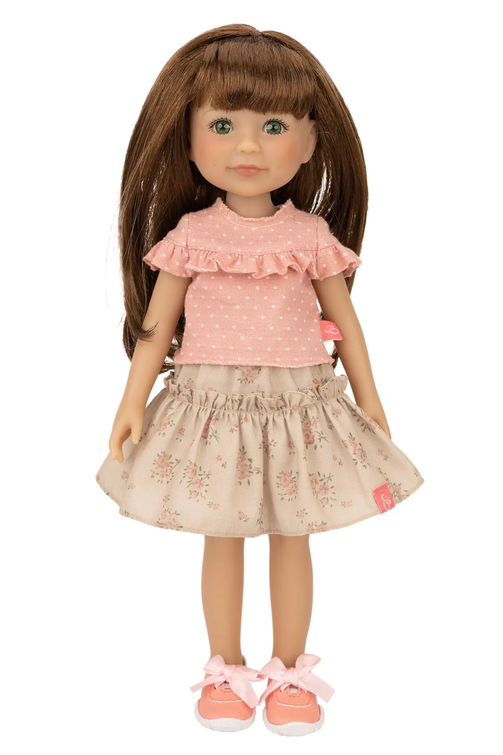 Jolli Buddies Joey Doll wearing a pink top and floral skirt on a white background