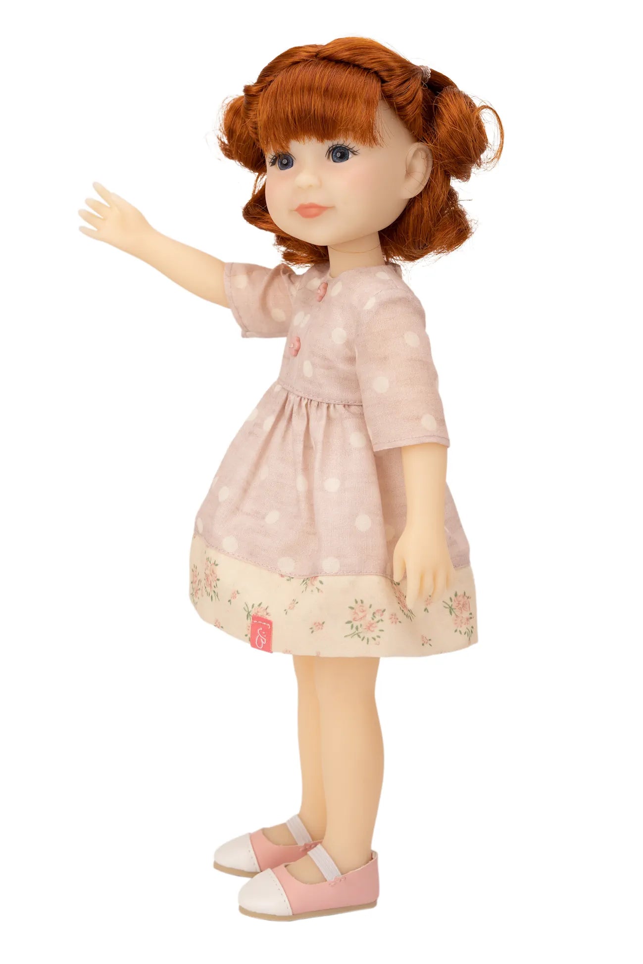 Jolli Buddies Leanne Doll with red hair wearing a pink dress on a white background