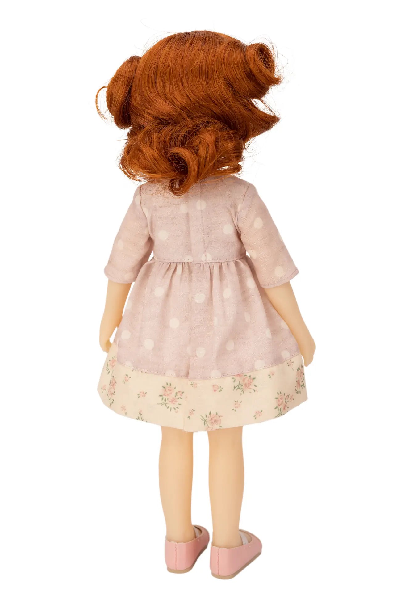 Jolli Buddies Leanne Doll with red hair wearing a pink dress on a white background
