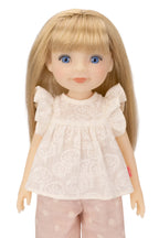 Jolli Buddies Lisa Doll with blonde hair and blue eyes wearing a white lace top and pink pants on a white background