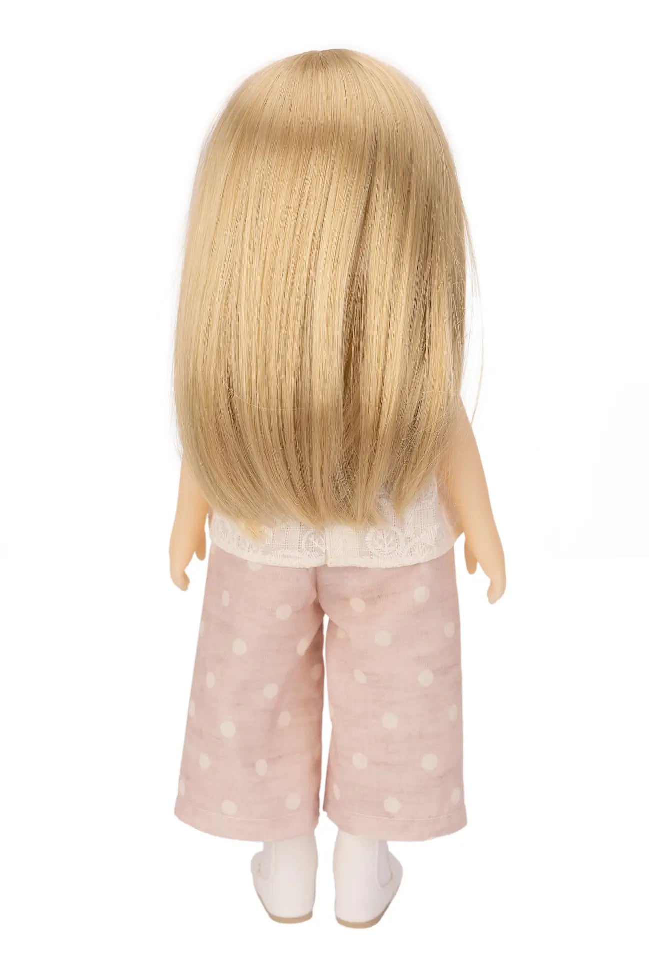 Jolli Buddies Lisa Doll with long blonde hair wearing a white top and pink polka dot pants on a white background