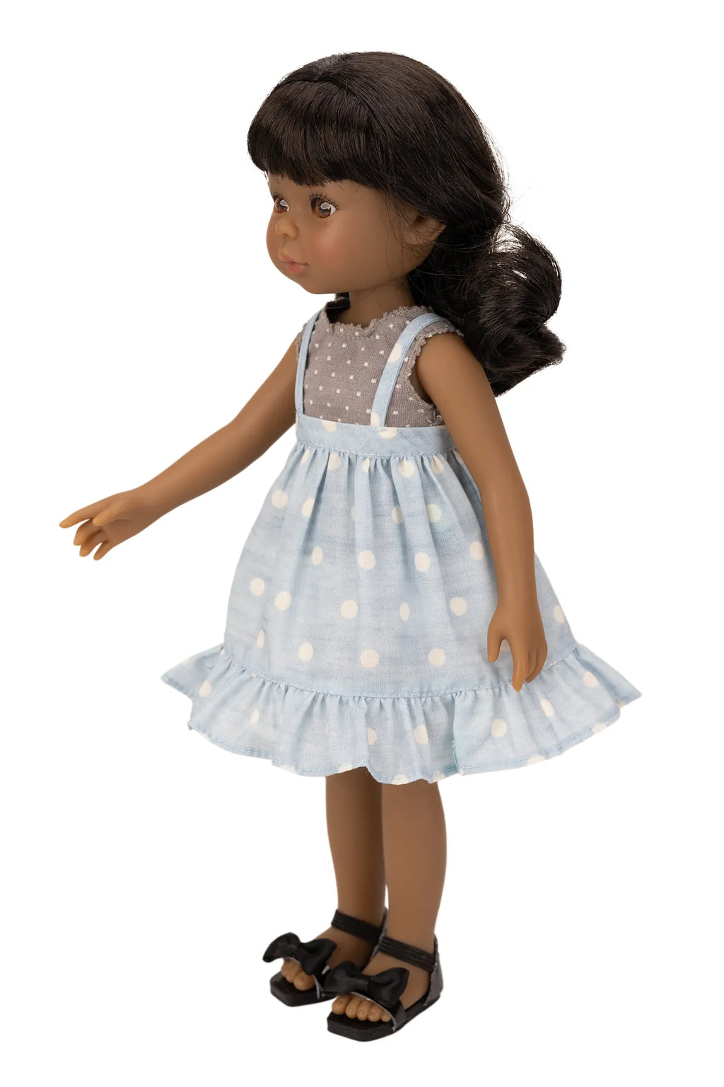 Jolli Buddies Ophelia Doll wearing a light blue dress with white polka dots on a white background