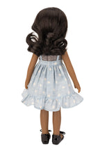 Jolli Buddies Ophelia Doll with a blue polka dot dress on a white background