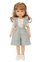 Jolli Buddies Uma Doll wearing a gray outfit with a white background