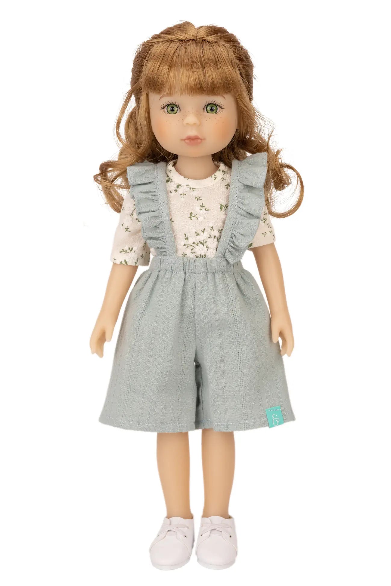 Jolli Buddies Uma Doll wearing a gray outfit with a white background