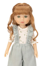 Jolli Buddies Uma Doll wearing a floral top and gray overalls on a white background