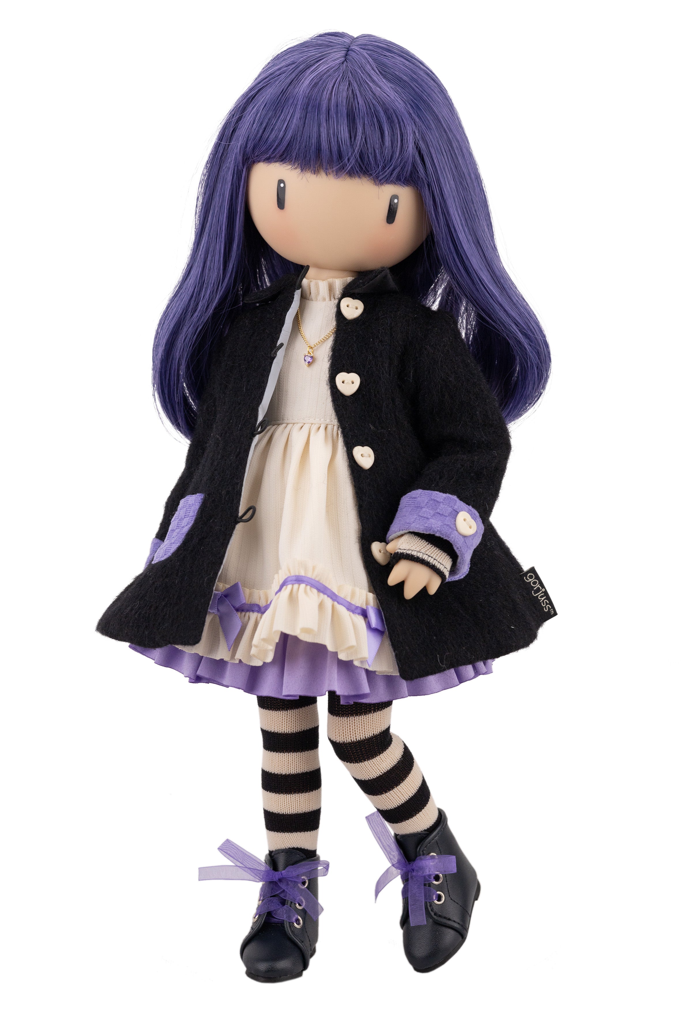 Doll with purple hair and outfit on a white background