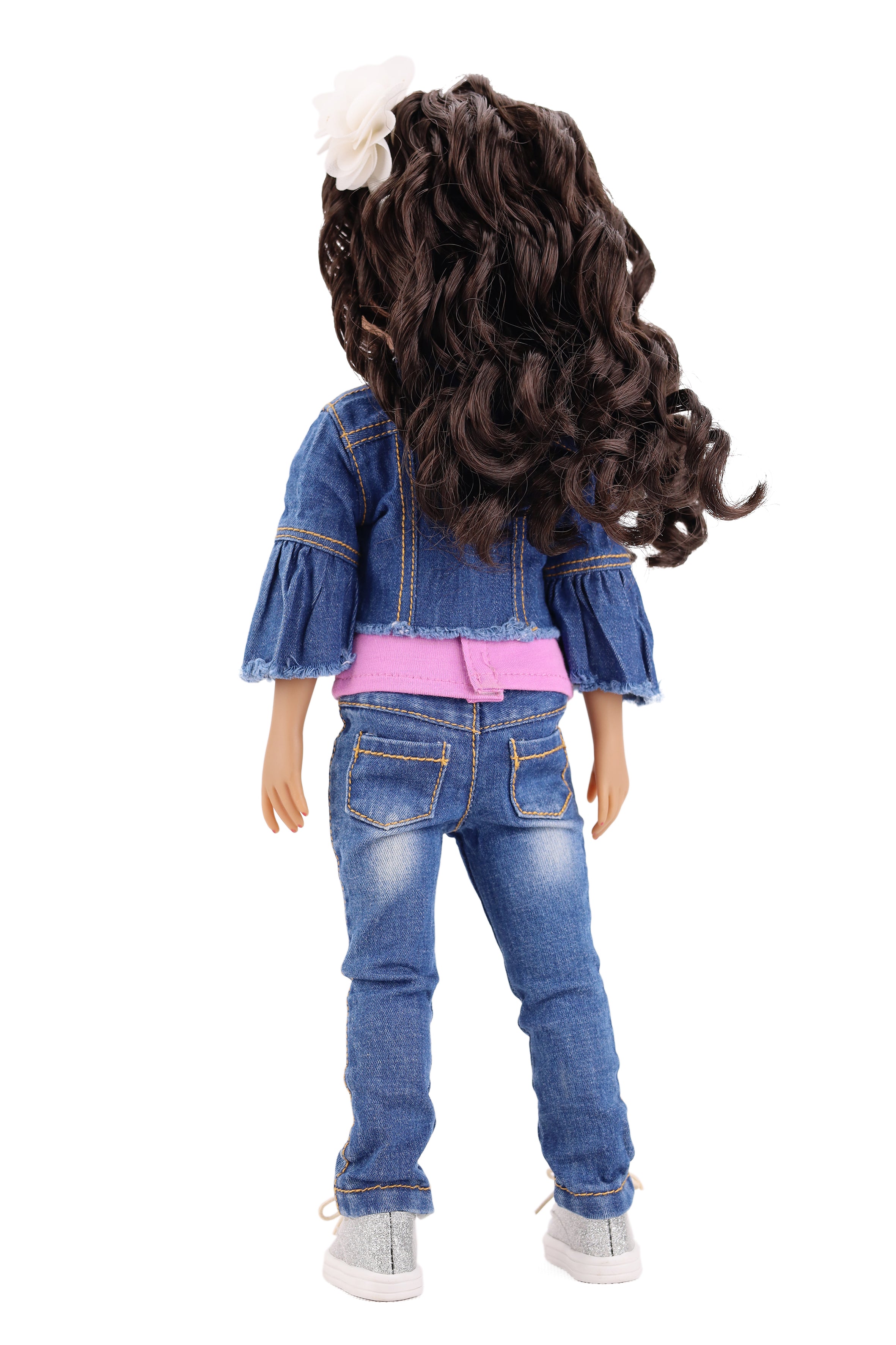 Doll with curly hair wearing a denim jacket and jeans on a white background