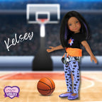 Doll named Kelsey on a basketball court with a basketball