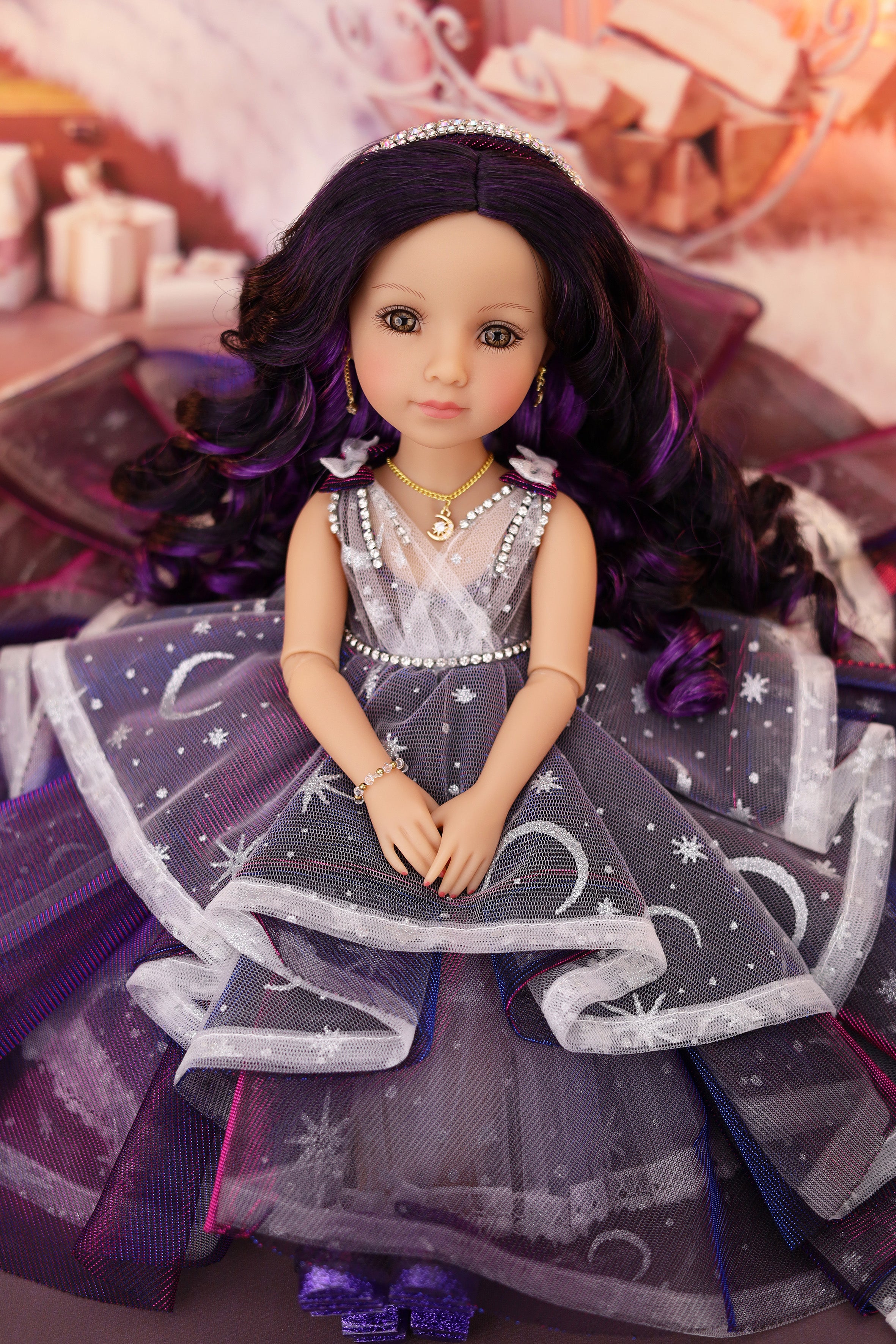 Doll with a gray dress with star patterns and purple hair in a decorative setting.