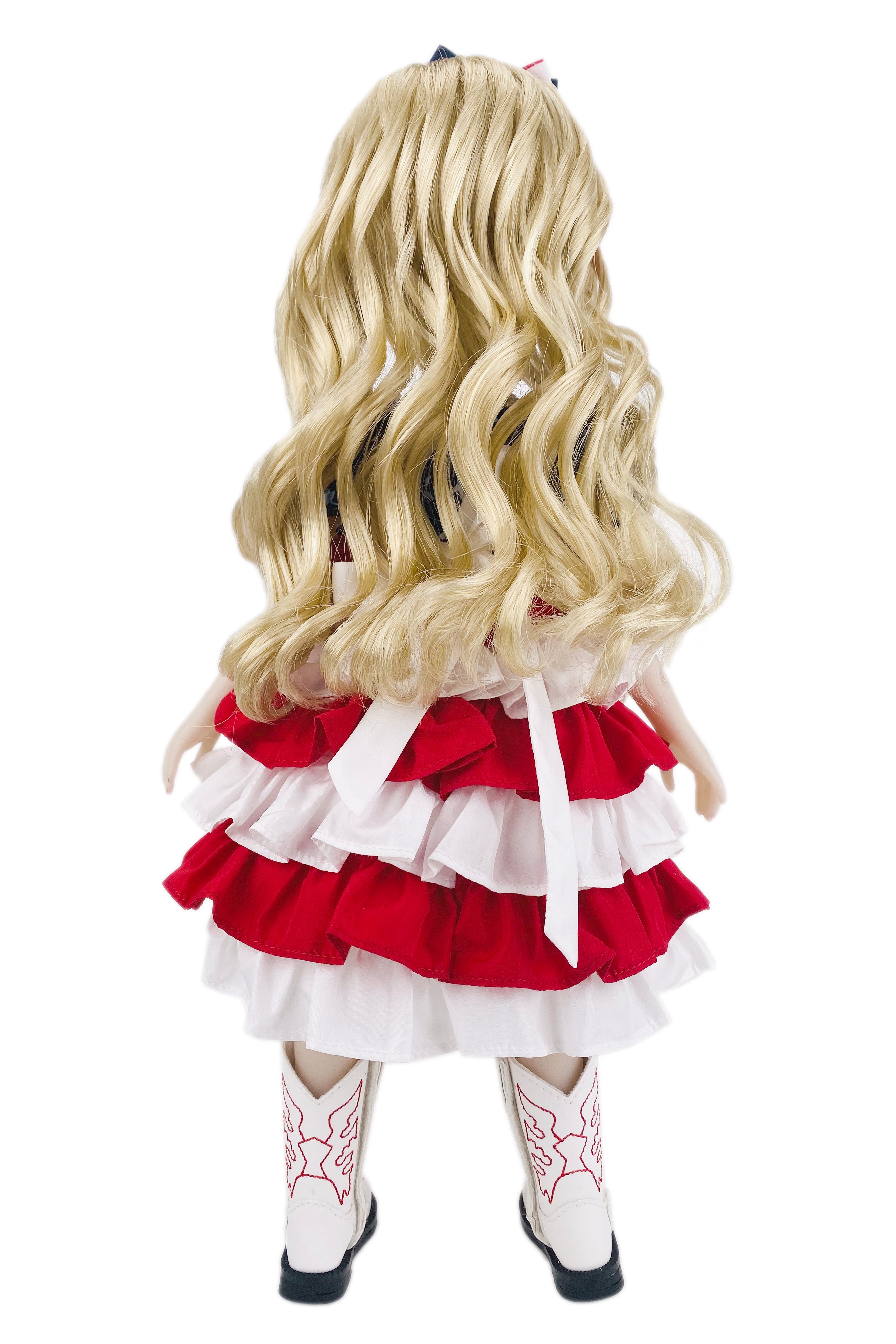 Doll with blonde hair, red and white dress on a white background