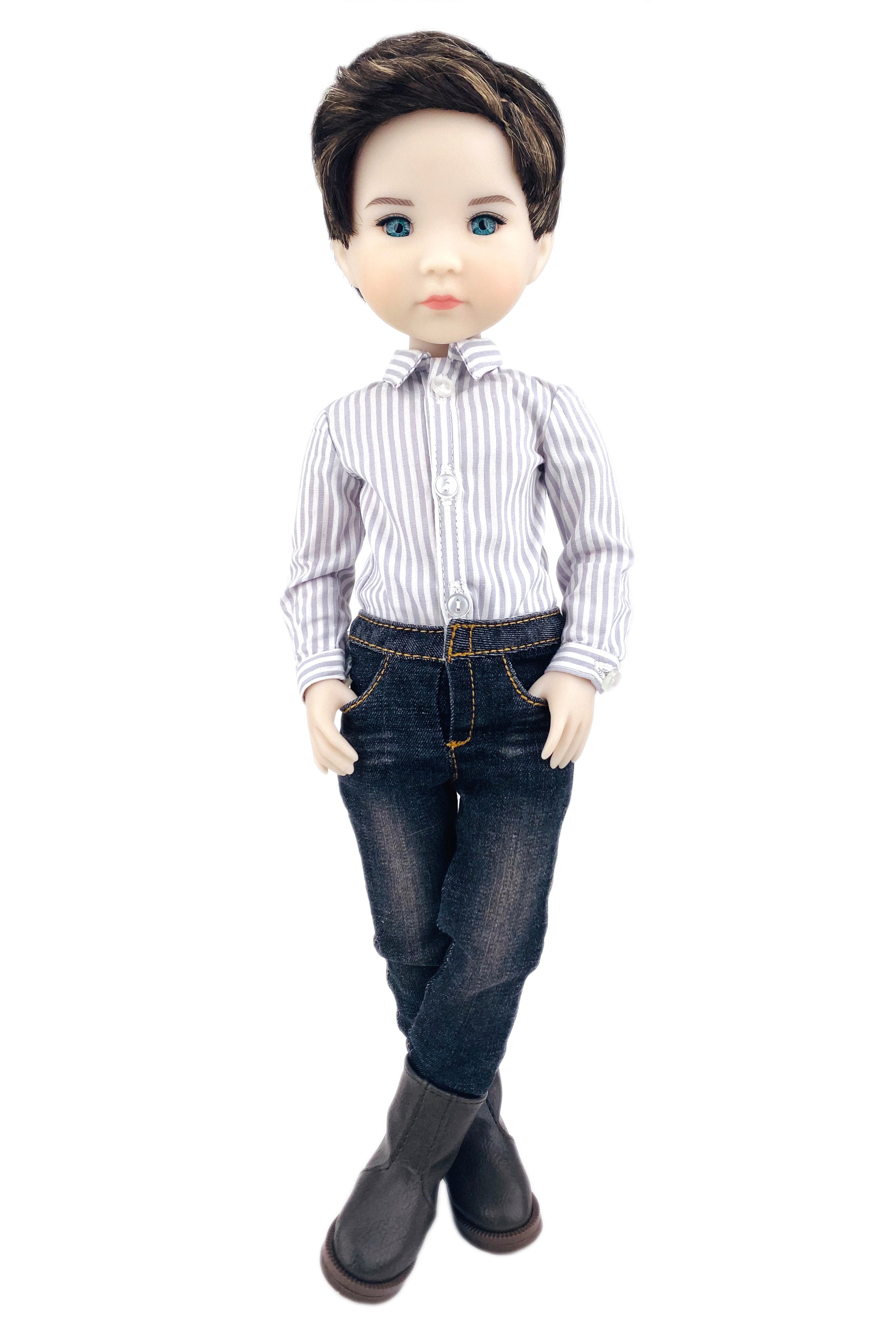 Doll wearing a striped shirt and jeans on a white background