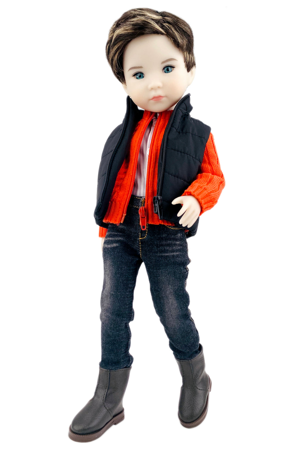 Doll wearing an orange shirt, black vest, blue jeans, and gray boots on a white background