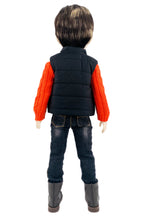 Back view of a person wearing an orange shirt, black vest, blue jeans, and black boots on a white background