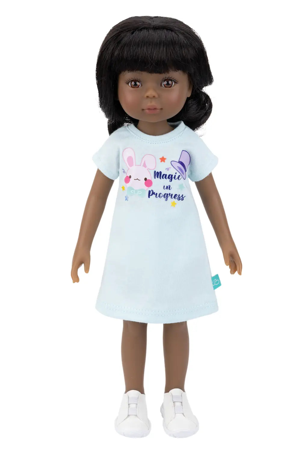 Doll wearing a light blue dress with colorful graphics on a white background