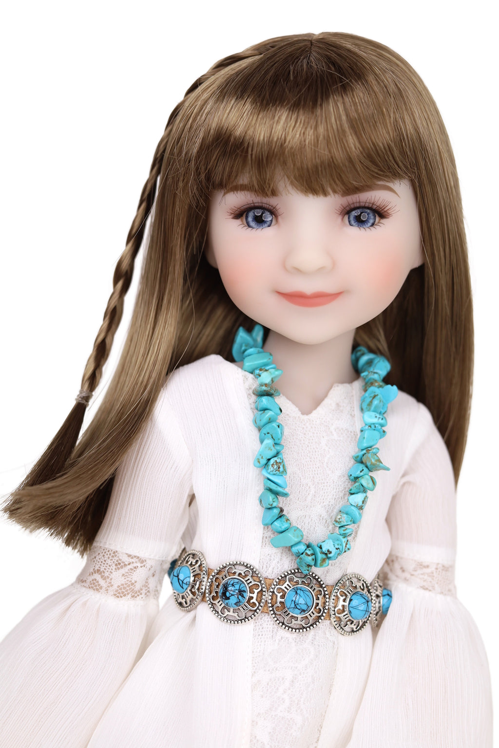 Doll wearing a white dress with lace details and a turquoise necklace on a white background