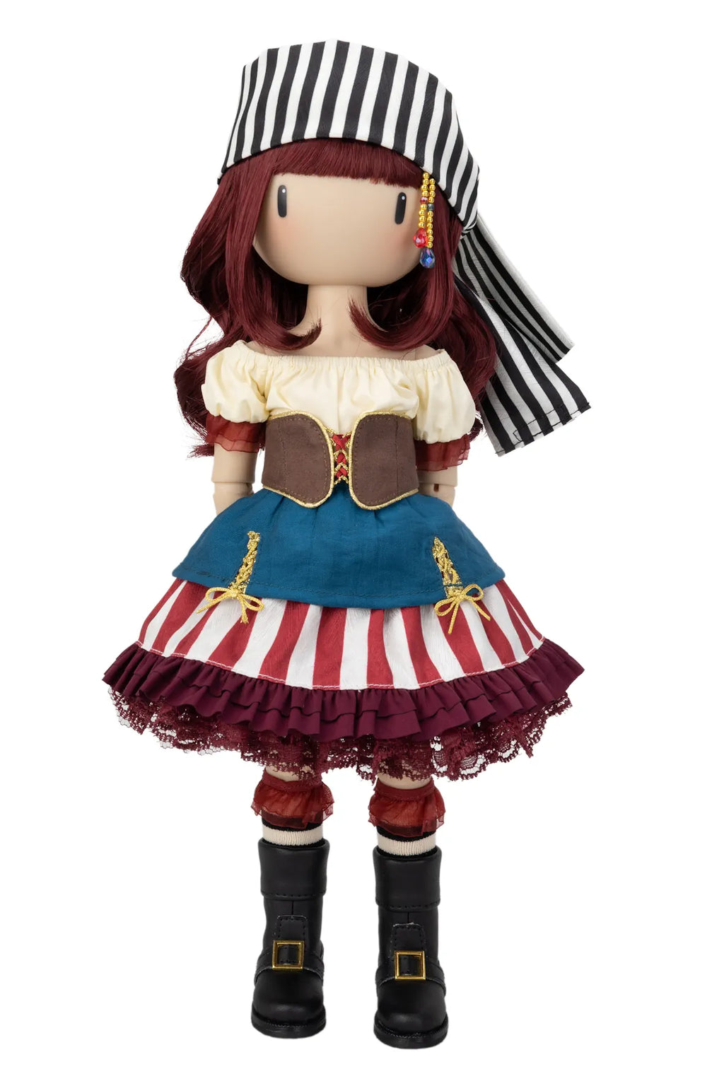 A Gorjuss doll dressed in a pirate outfit, featuring a black and white striped hat, burgundy hair, a cream puff-sleeve top, a brown corset, a blue and red-and-white striped skirt, and black boots, shown against a plain white background.
