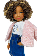 Doll wearing a pink jacket, white shirt with text, and blue denim skirt on a white background