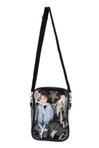 A doll carry bag with mini Stella doll and guitar placed inside the bag with white background