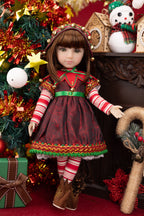 Doll in a festive outfit with Christmas decorations in the background