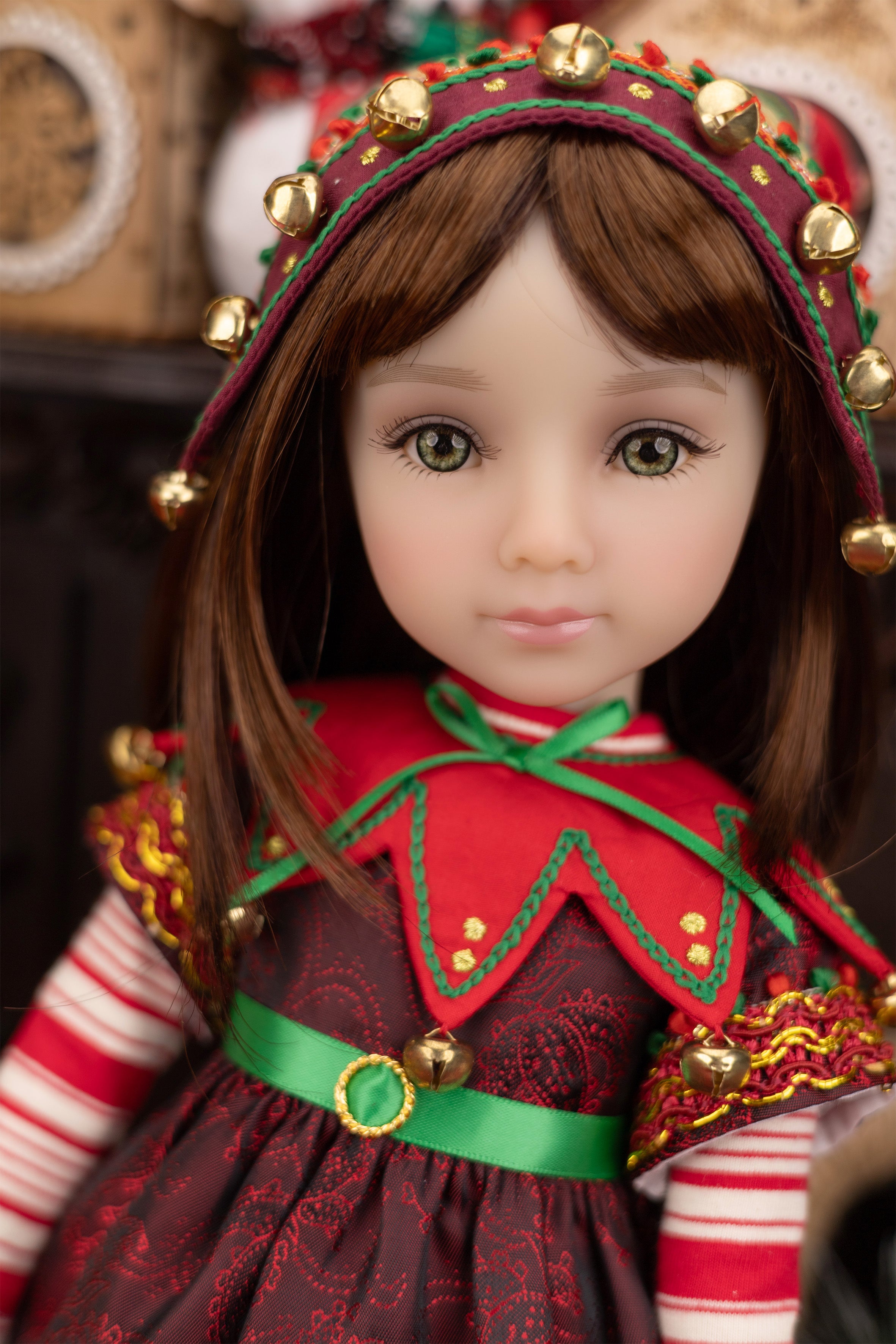 Doll in festive outfit with red and gold details